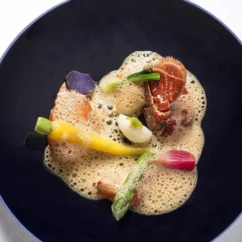 Recette de Christopher Coutanceau : civet de homard et raviole de champignons